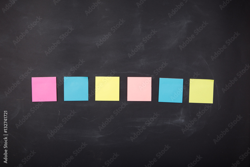 sticky notes on the blank blackboard