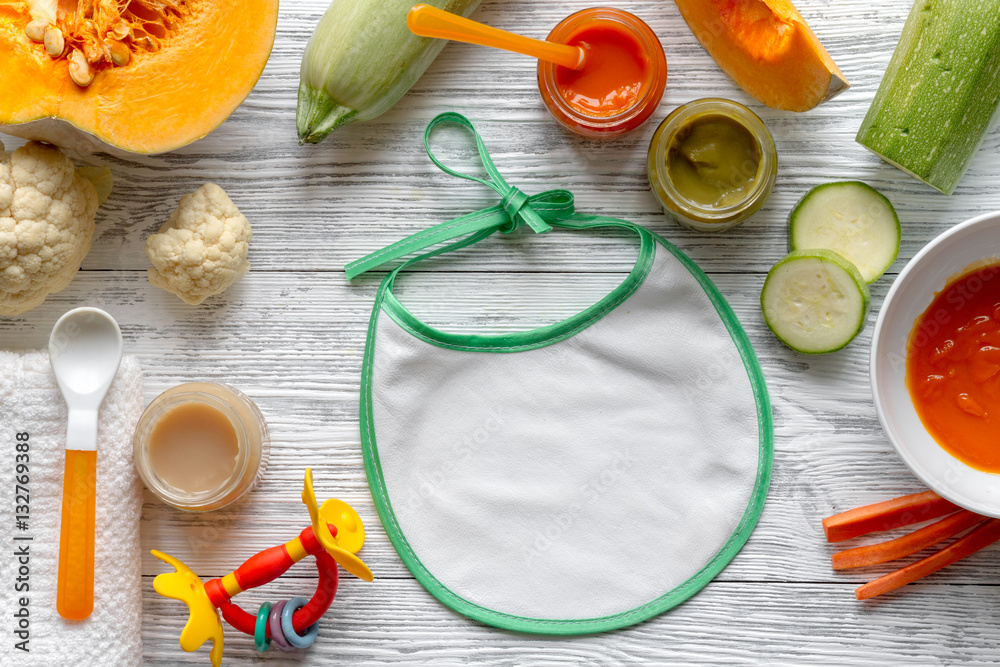 baby vegetable puree on wooden background top view