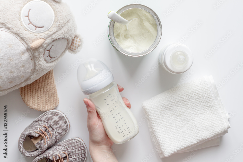 preparation of mixture baby feeding on white background top view