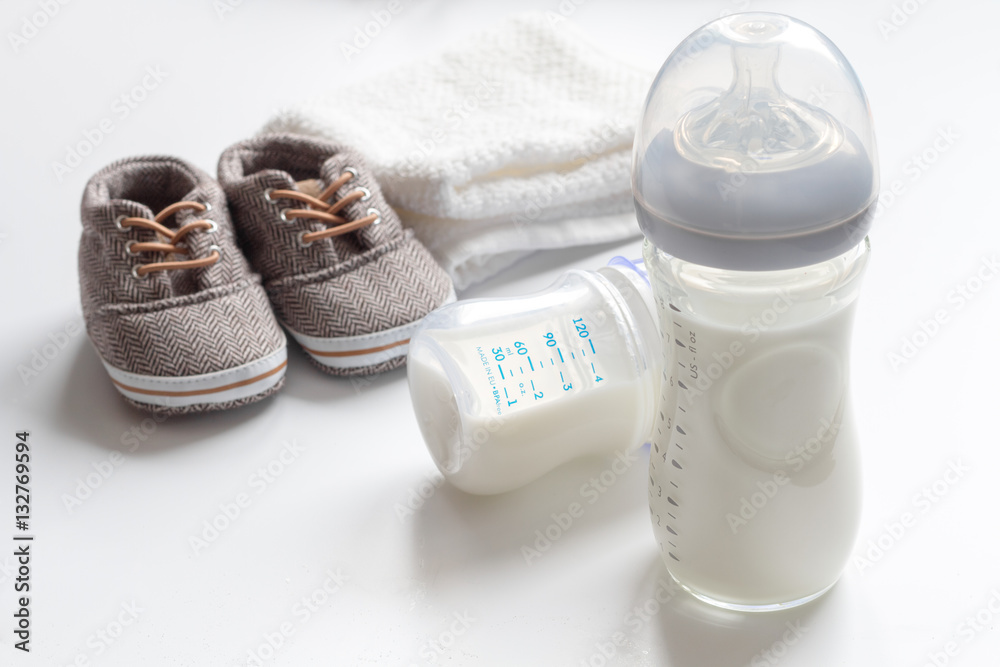 preparation of mixture baby feeding on white background