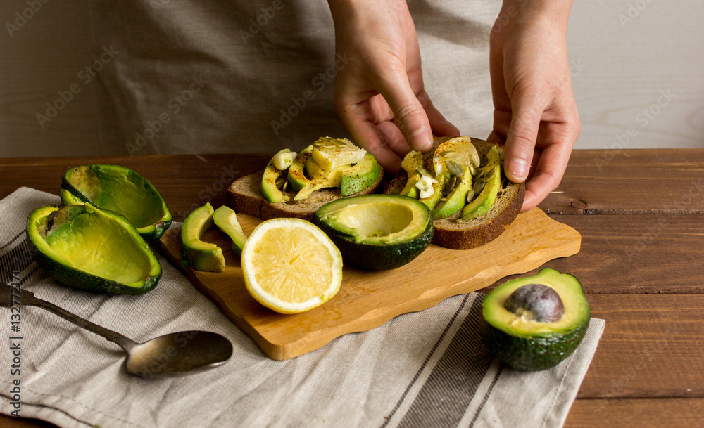 making sandwiches with avocado healthy organic food