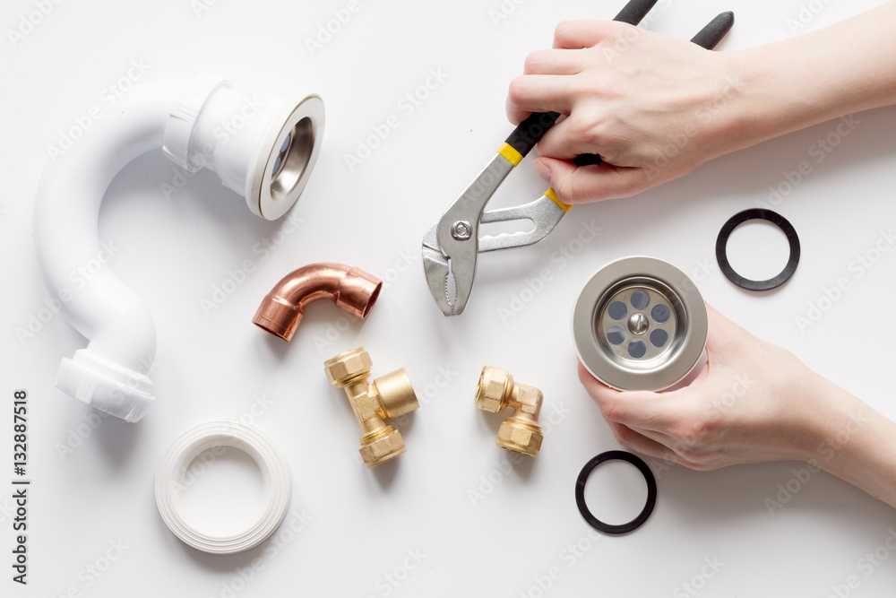 concept plumbing work top view on white background