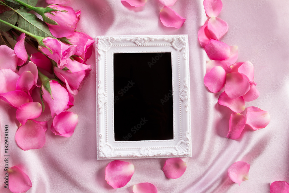 Empty photo frame with a bouquet sweet pink roses  petal 