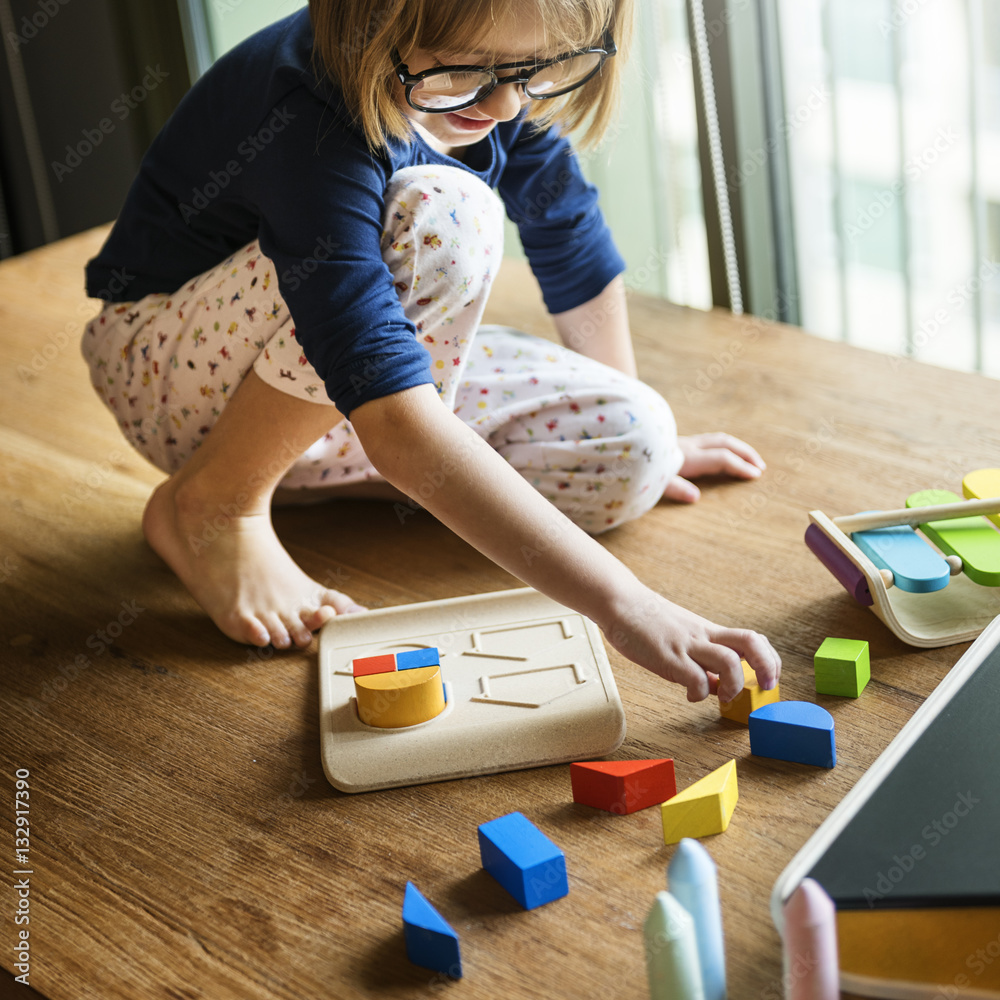 Little Girl Playing Toys Concept