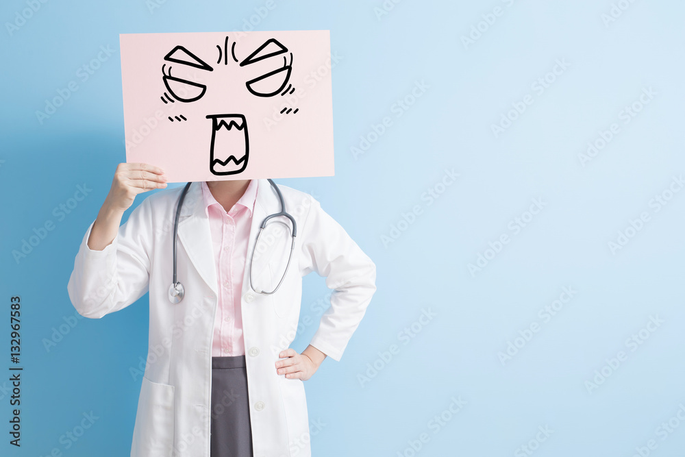 woman doctor show angry billboard