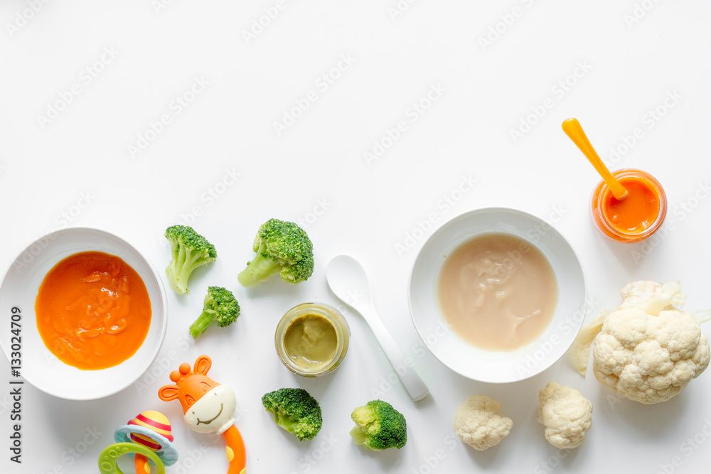 cooking vegetable puree for baby on white background top view