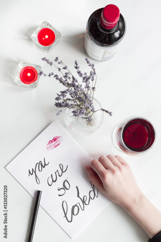 concept of Valentine Day love letter white background top view