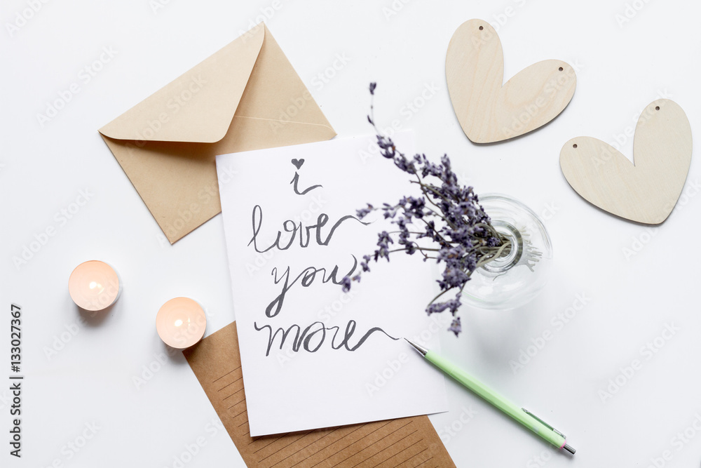 concept of Valentine Day love letter white background top view