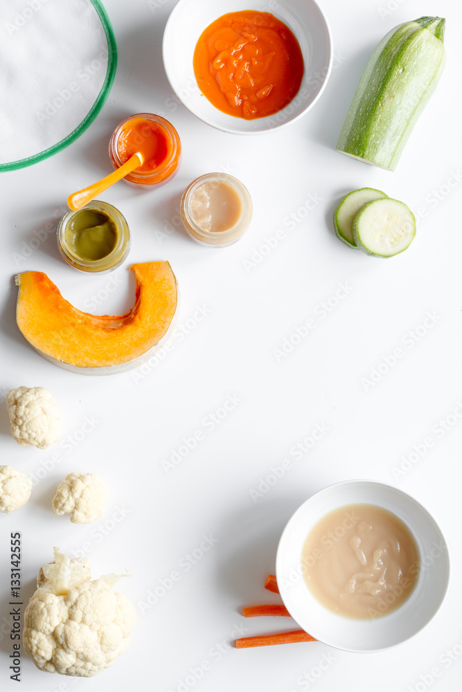 cooking vegetable puree for baby on white background top view