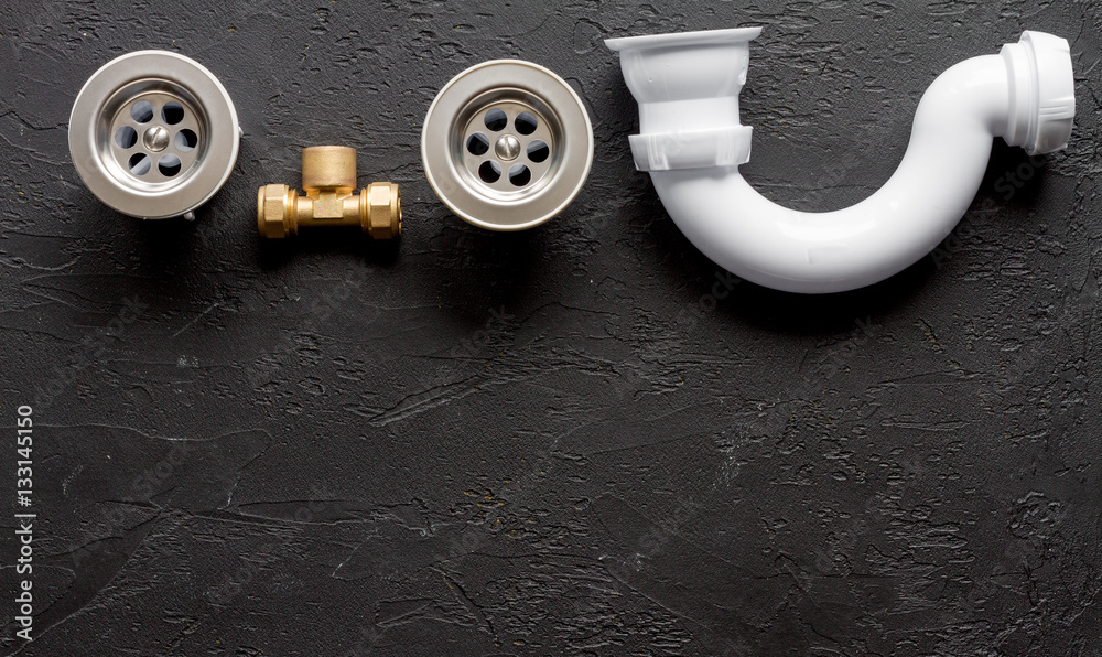 concept plumbing work top view on dark background