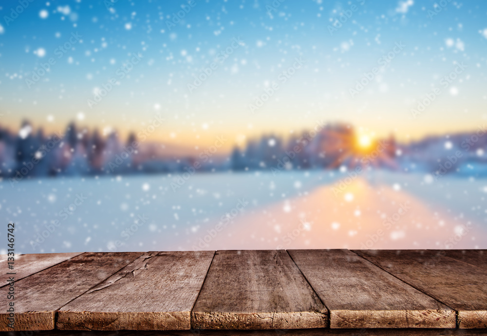 Empty wooden planks with winter mountains