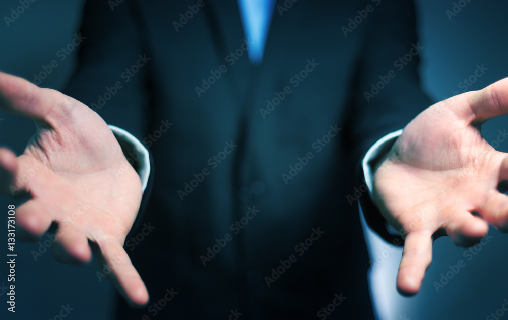 Businessman showing his empty hand