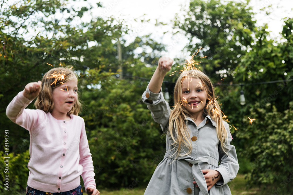 Small Girls Playing Outdoors Concept