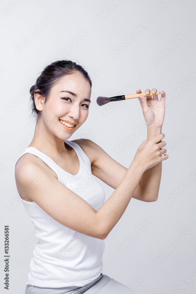 Beauty makeup asian woman smiling closeup. Beautiful young woman