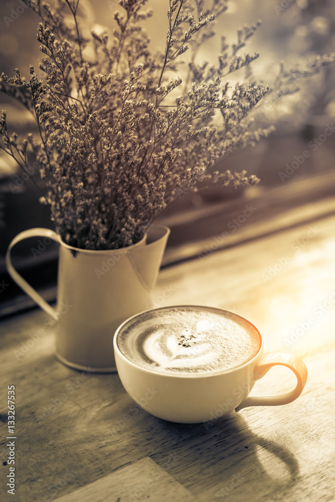 Cup of Latte in coffee shop background