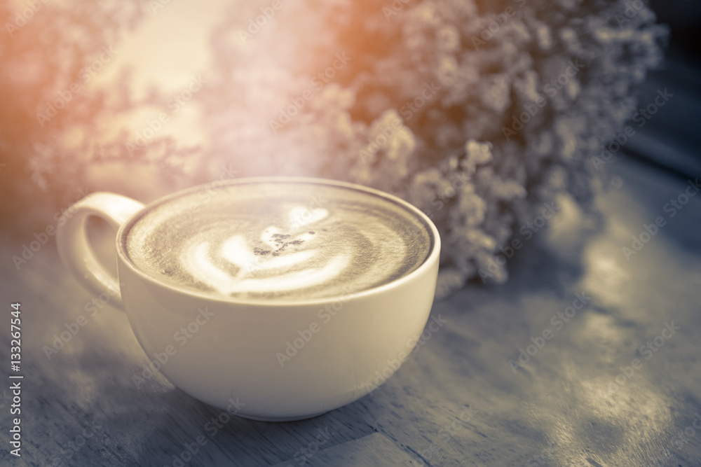 Cup of Latte in coffee shop background