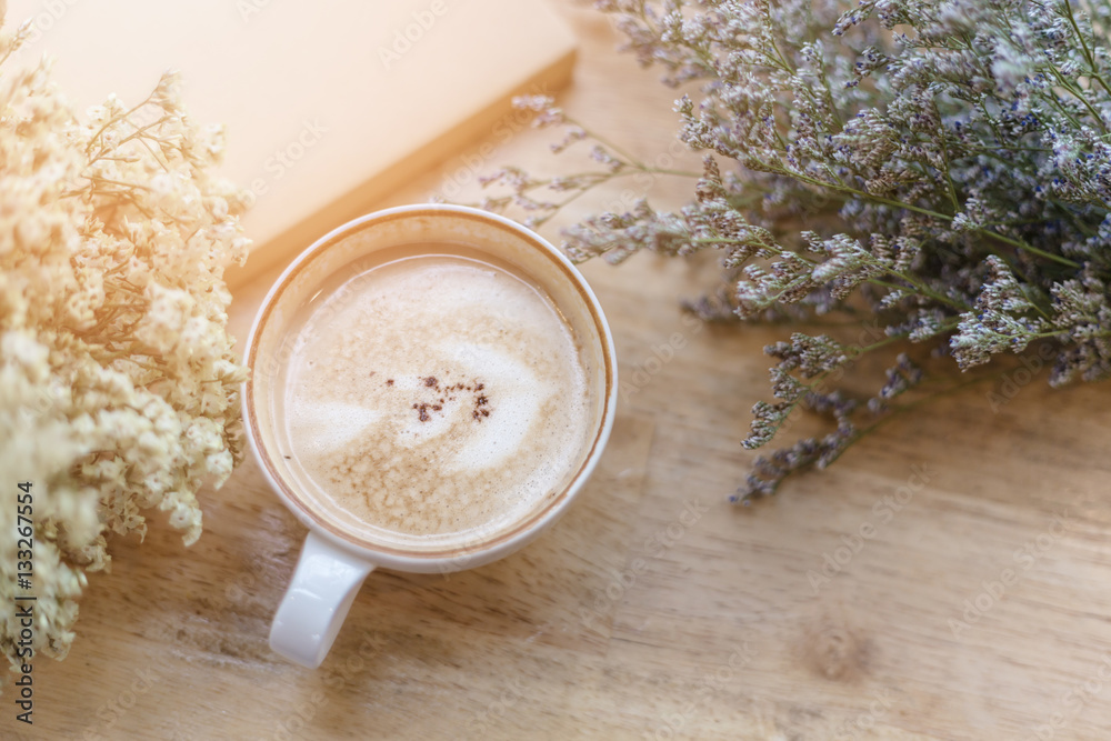 Cup of Latte in coffee shop background