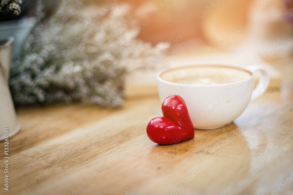 Good morning with hot chocolate on wooden table with love red he