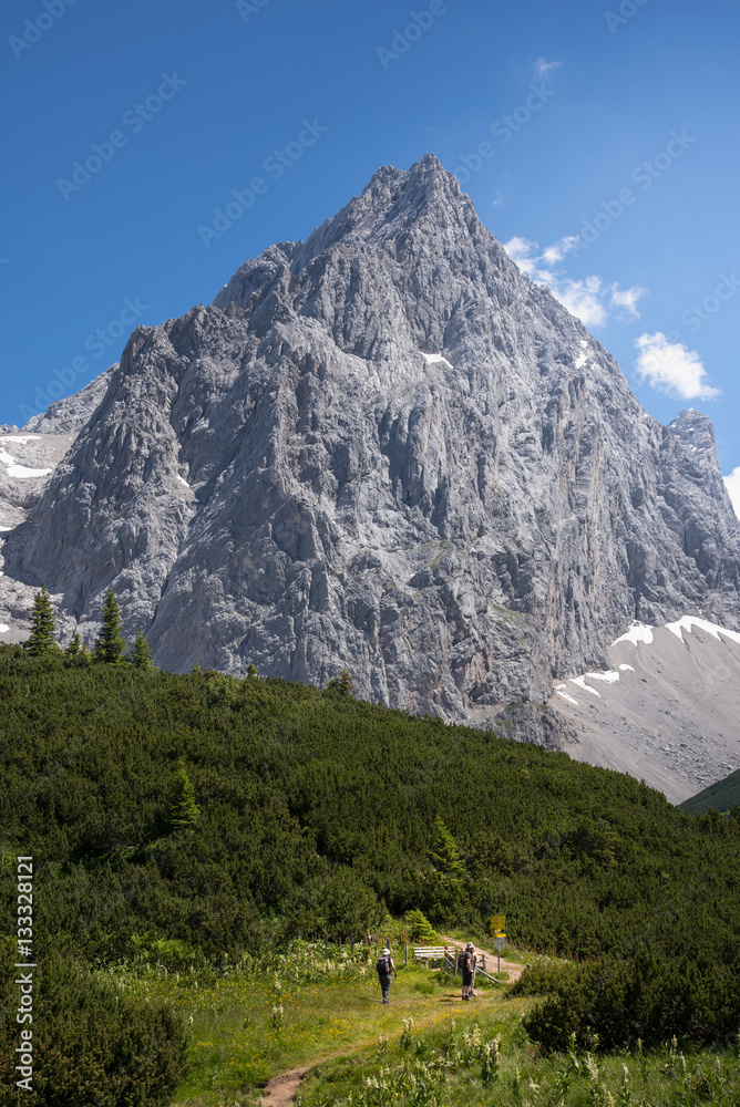 Mountain hiker in alpine landscape, Austria