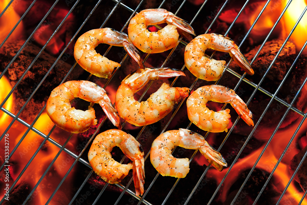 Grilled shrimps,prawns on the flaming grill