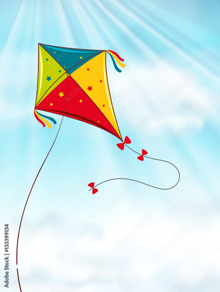 Colorful kite flying in blue sky