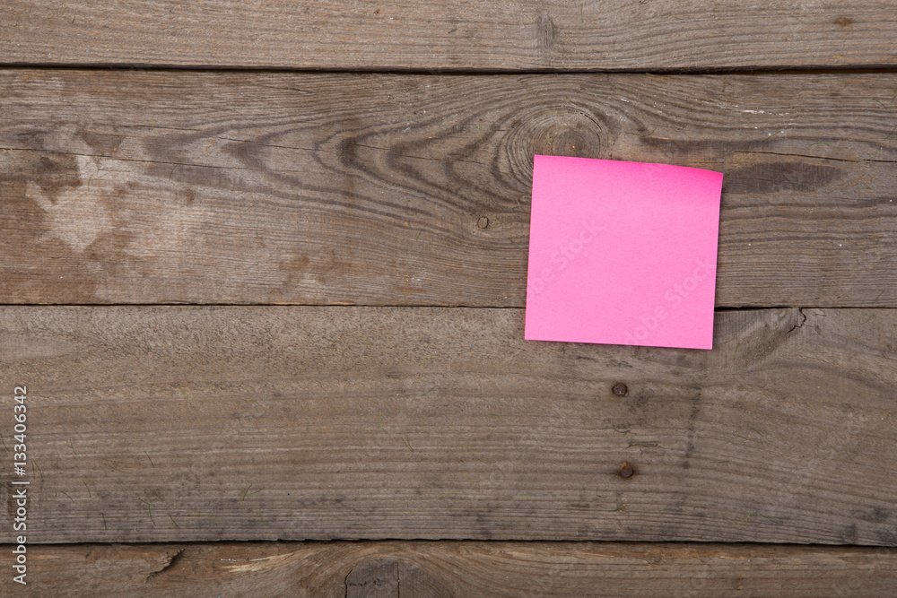 sticky note on the blank blackboard