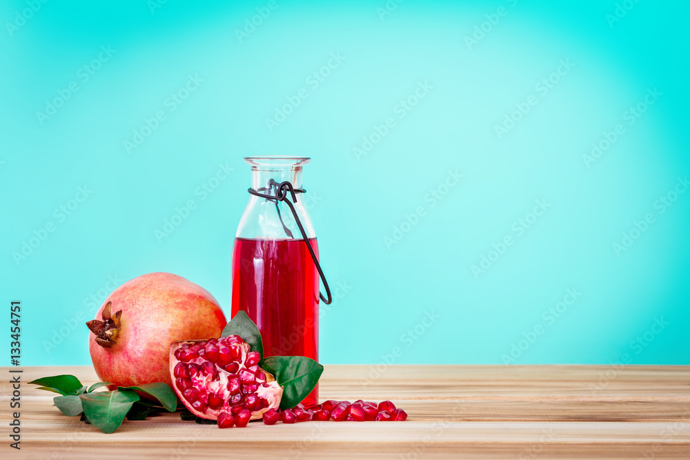 fresh red pomegranate juice with pomegranate seed and fruit 