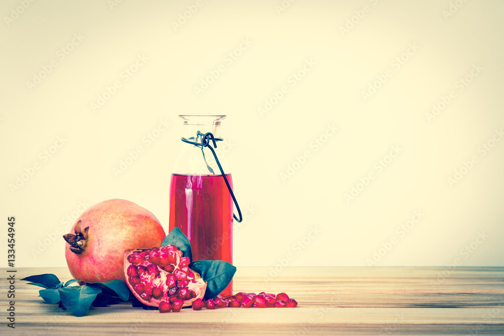 fresh red pomegranate juice with pomegranate seed and fruit 