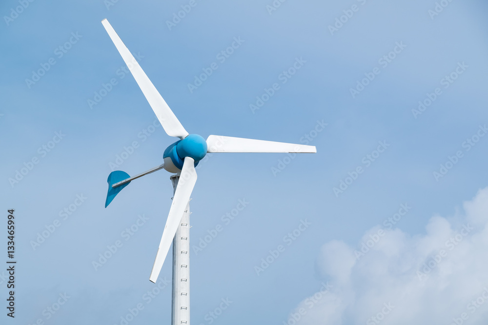 Close up wind turbine, renewable energy and power concept.