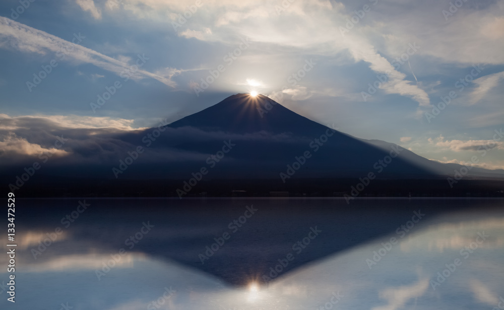 Fuji diamond , Sunset on Top of Mountain Fuji and refection at Lake Yamanakako in autumn season