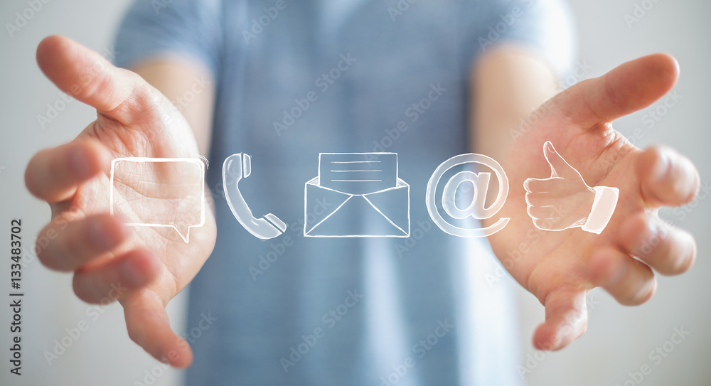 Businessman holding manuscript contact icon in his hand