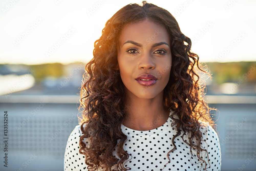 Attractive black woman looking at camera