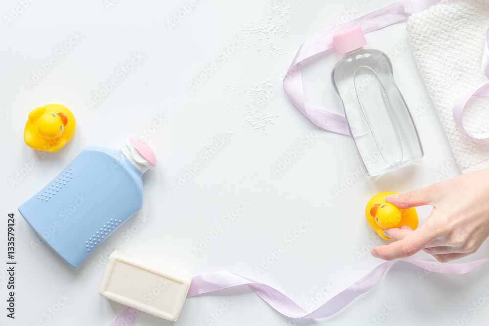 baby accessories for bath with duck on white background