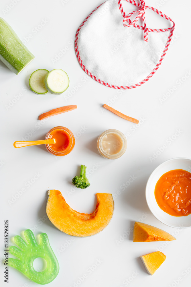 cooking vegetable puree for baby on white background top view