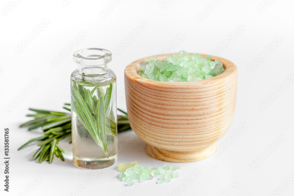 organic cosmetics with extracts of herbs rosemary on white background