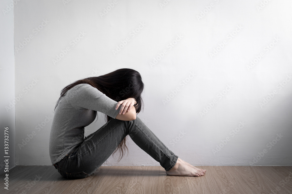 depression woman sit on floor