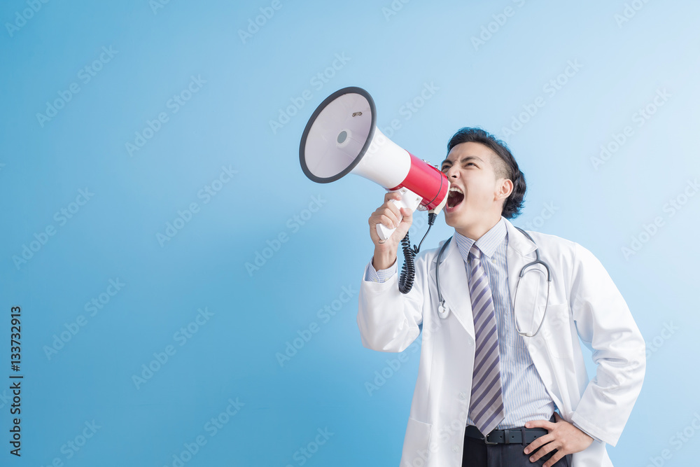 male doctor take microphone