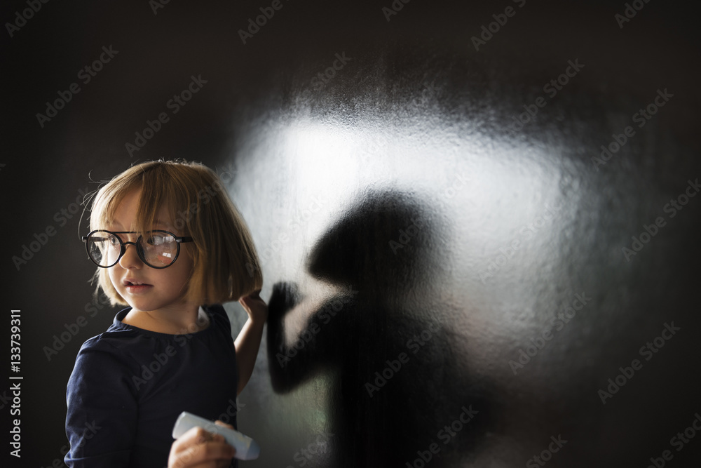 Little Girl Writing Blackboard Concept