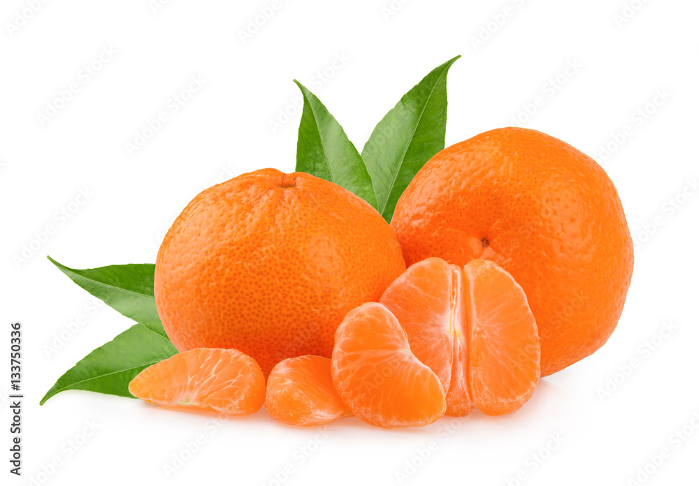 Tangerines with leaves and slices on white background