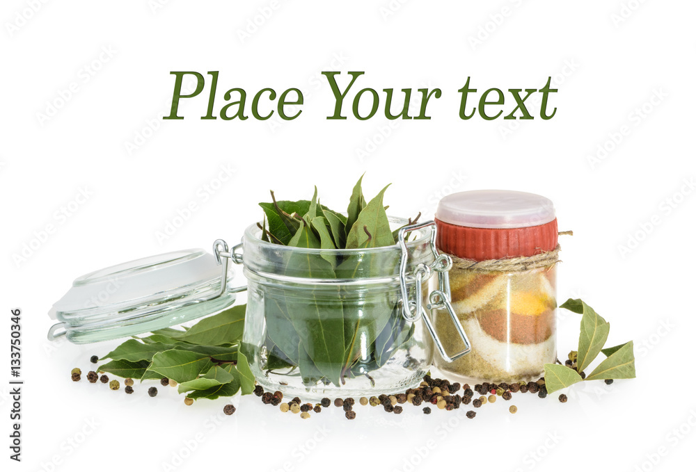 Bay leaves and spices isolated on a white