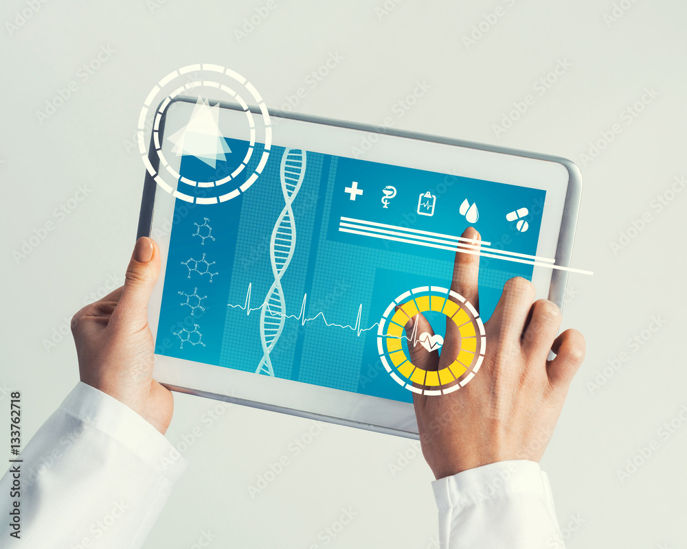 Close of female doctor hands working with tablet pc computer