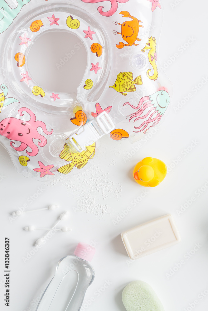 baby accessories for bath with duck on white background