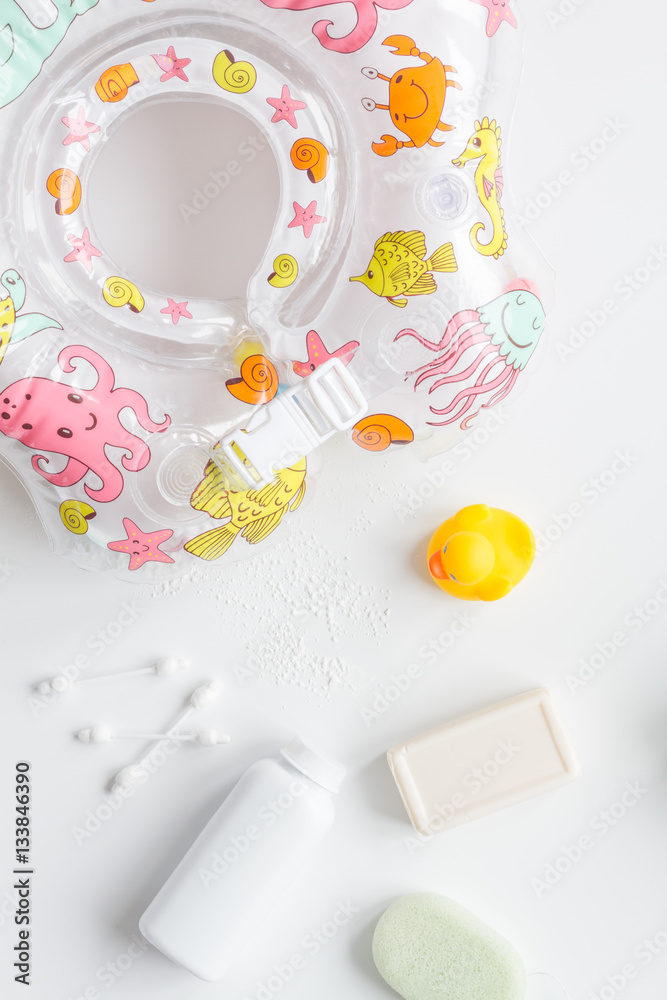 baby accessories for bath with duck on white background