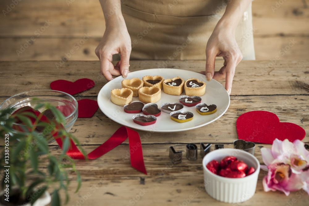 Women are making a lot of chocolate with feelings