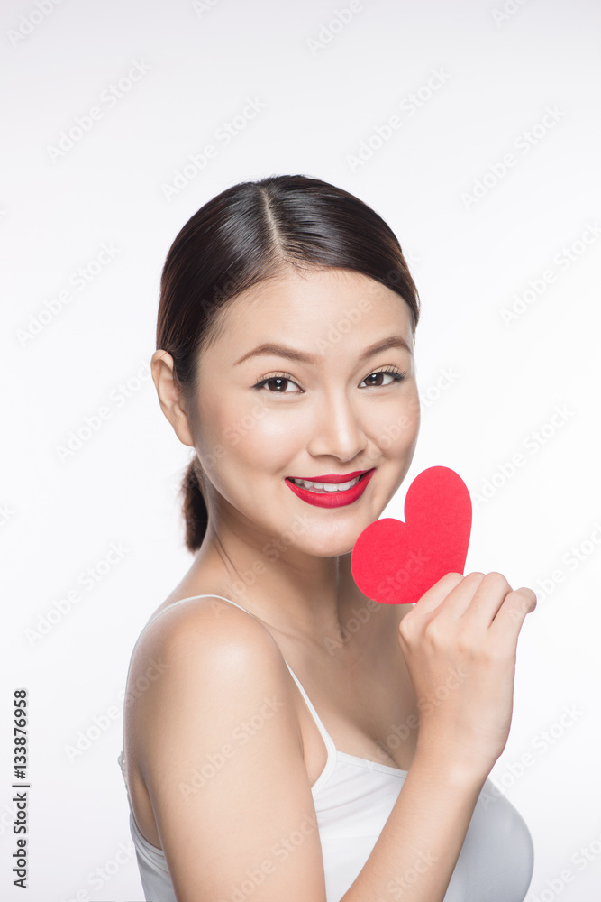 Cute attractive young woman with red heart. Valentines day art