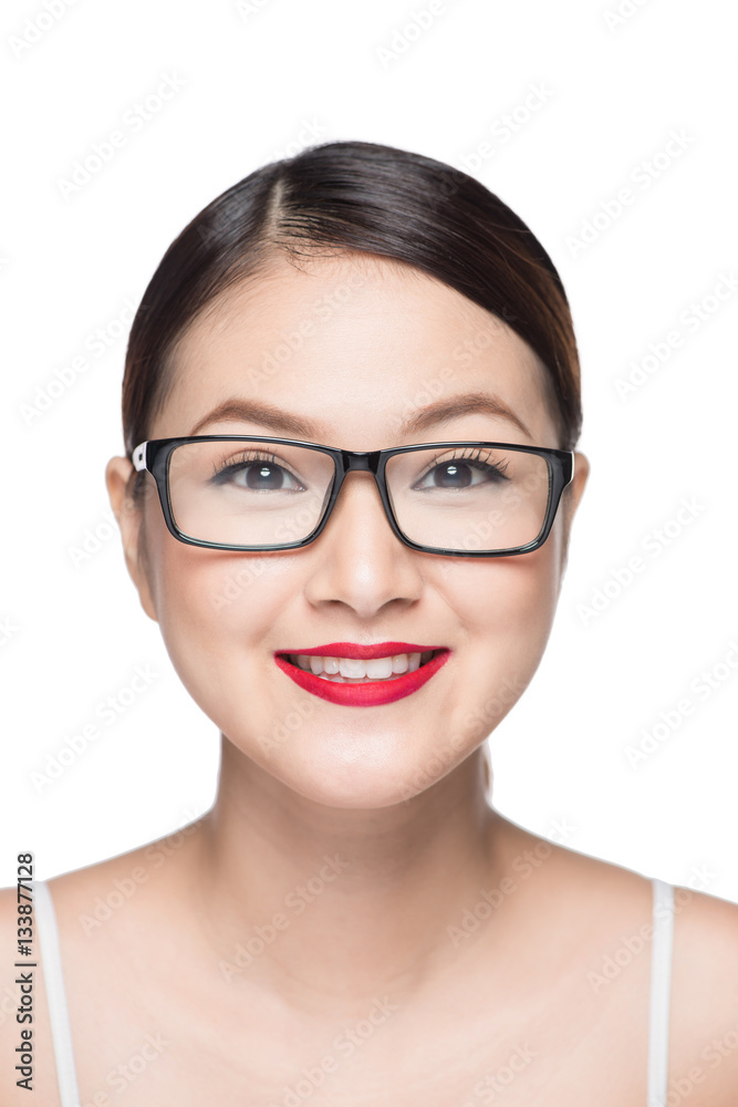 Beauty asian model girl with perfect skin wearing glasses, isolated on white