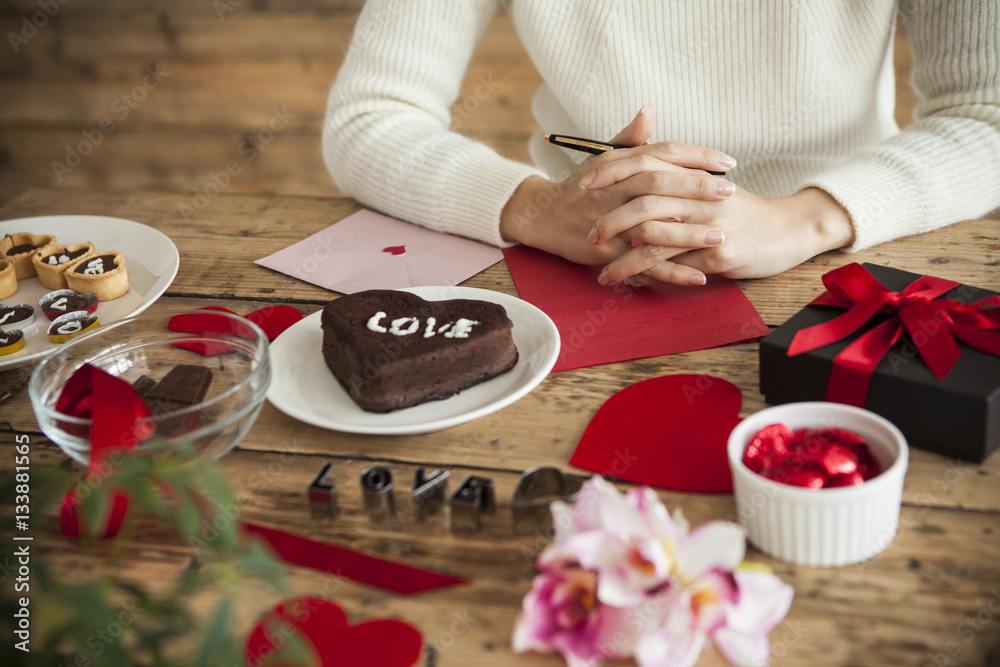 woman is considering the contents of a letter