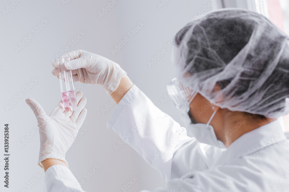 Female chemist working in laboratory