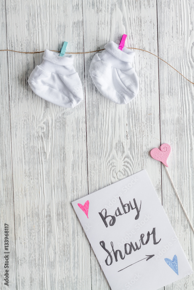 birth of child - baby shower concept on wooden background