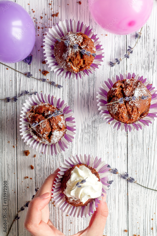 concept of Valentines Day cupcakes wooden background top view